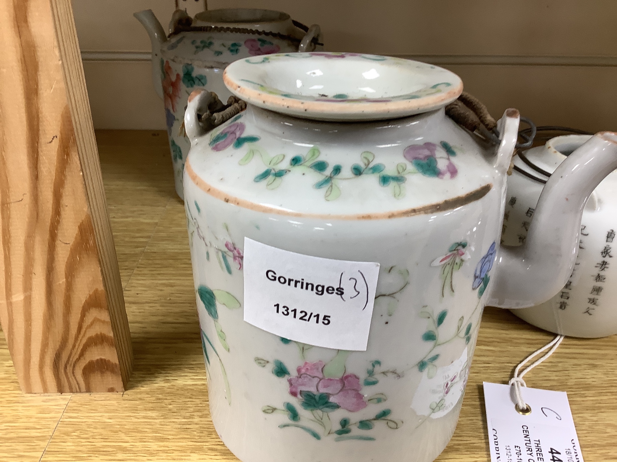 Three 19th century Chinese famille rose teapots, tallest 14cm